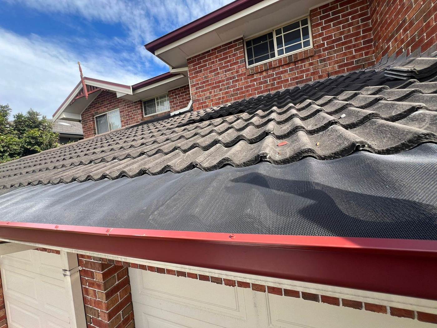 Gutter guard installed on a tiled roof of a Sydney home